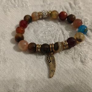 Stone Bracelet with wing charm